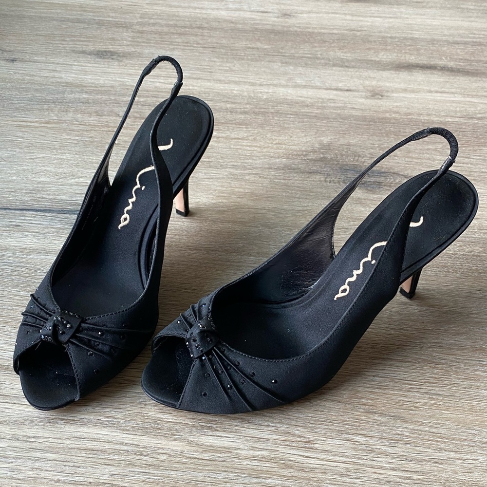 Nina Vintage Black Satin Heels from mid 1990’s
Size 8M